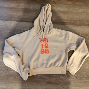 Beige Hoodie with Orange Graphic